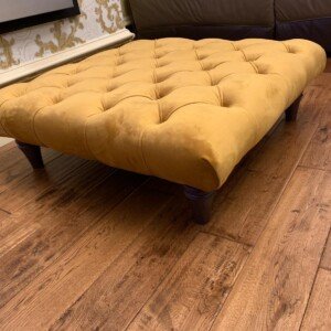Zara Chesterfield Footstool Pouffe Coffee table with black turned Legs, Far angle
