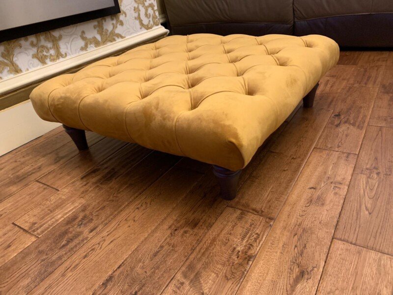Zara Chesterfield Footstool Pouffe Coffee table with black turned Legs, Far angle